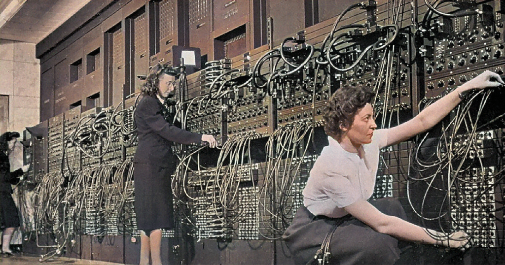 Early telephone operators at manual switchboard, photo